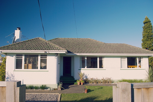 A typical stucco plaster clad bungalow home. These homes were popular personal built homes in the 1940's- 1960's in New Zealand.