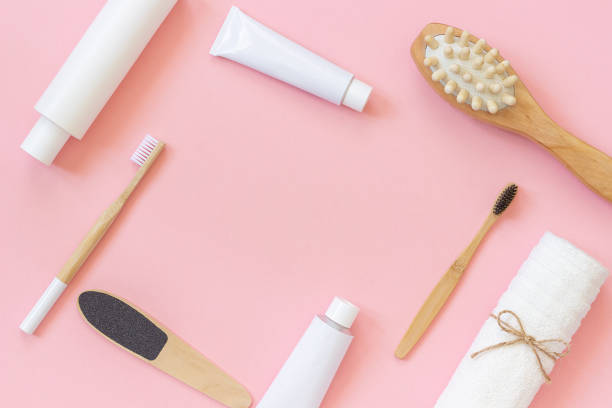 istock Set of cosmetics products and tools for shower or bath with copy space for text or design on pink background. Concept female morning body care, face, teeth for beauty and health. Top view Template 1156384926
