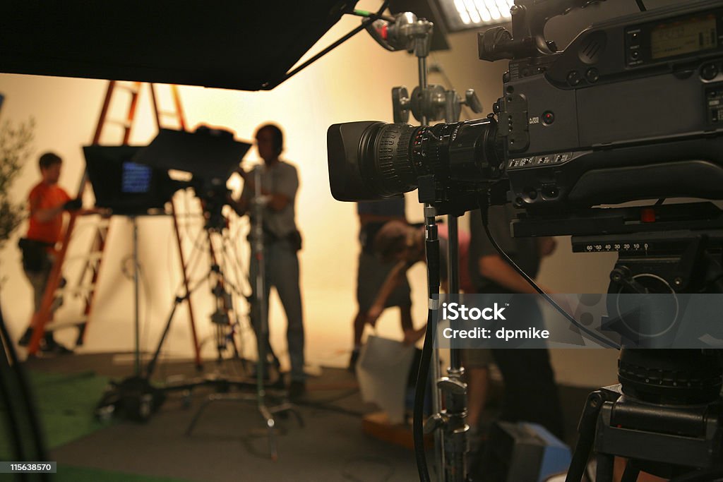 Photo TV Studio crew with camera Television crew working in a studio Film Industry Stock Photo