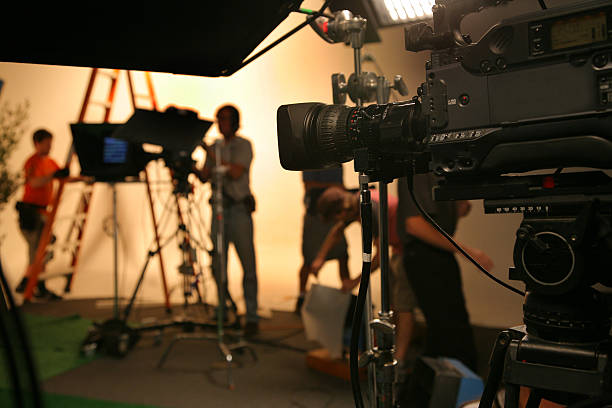 Photo TV Studio crew with camera Television crew working in a studio sound recording equipment photos stock pictures, royalty-free photos & images