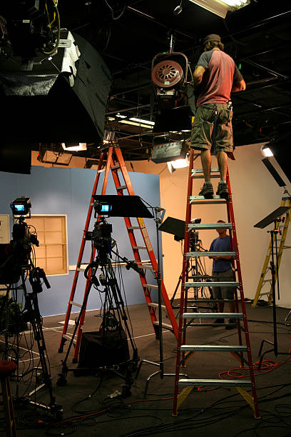 Photo TV studio lighting crew 1 stock photo