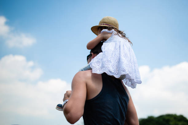 istock Father and daughter shoulder car 1156388214