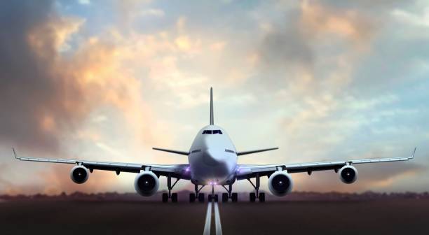 istock Airplane taking off from airport runways during sunset 1156388227
