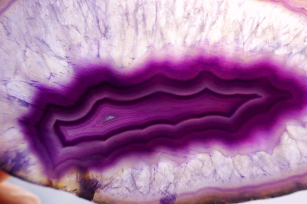 istock agate purple.agate slice mineral.Purple stone slice texture.Bright purple agate macro background.Phone wallpaper.agate texture. 1156389022