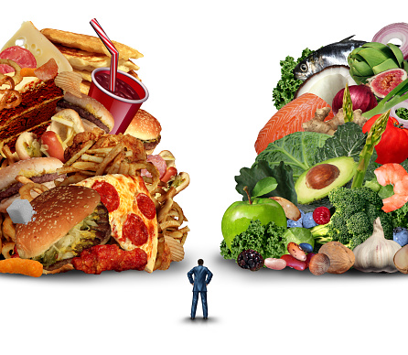 Diet lifestyle decision concept and nutrition choices dilemma between healthy good fresh fruit and vegetables or greasy cholesterol rich fast food with a confused person with 3D illustration elements