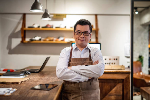 istock Successful Male Taiwanese Shoe Merchant 1156393584