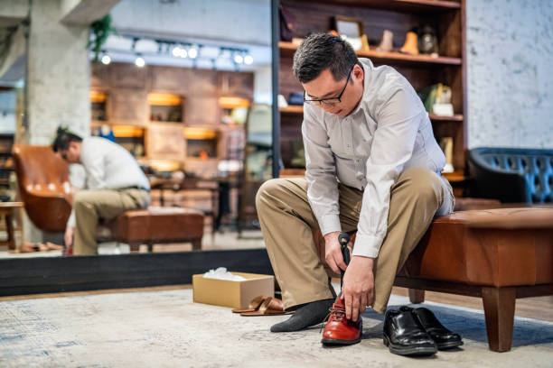 istock Male Taiwanese Quality Shoe Shopper 1156393596