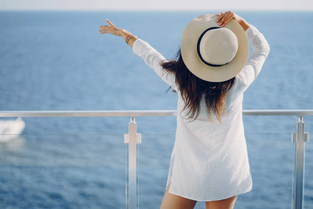 istock girl near sea 1156396076