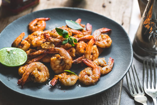 istock Sauteed Prawns with Garlic and Pimenton on a dish 1156396307