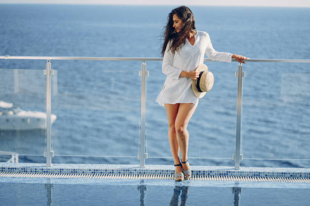 istock girl near sea 1156396326