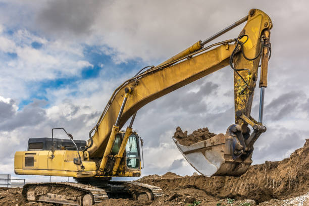 istock An excavator extracting dirt in a construction site 1156396630