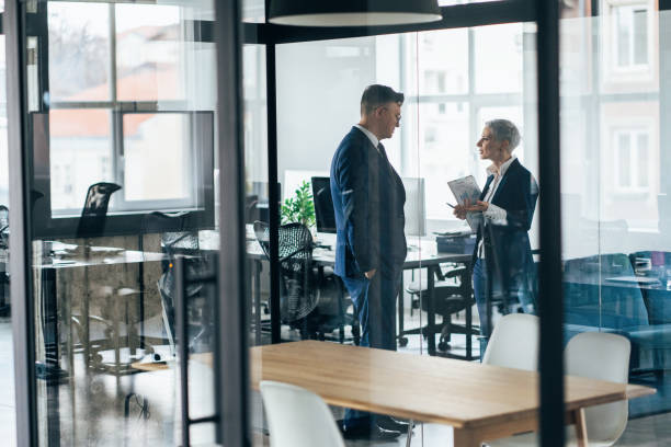 istock Business conversation in conference room 1156397263