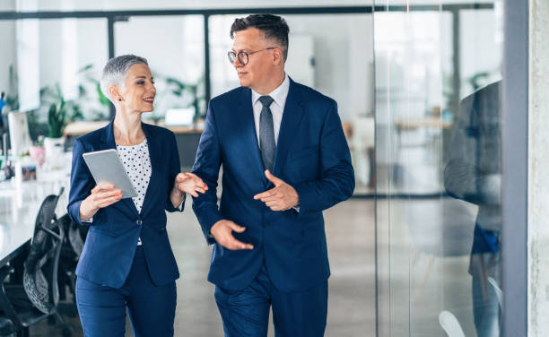istock Business partners in discussion 1156397264