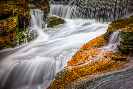 beautiful falling waterfall in the Karkonosze (Krkonoše, Giant Mountains) mountains