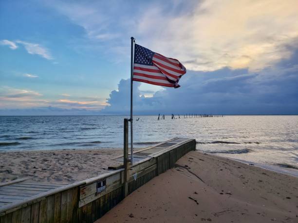 istock American Flag Flies Proud 1156398426