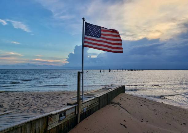 istock American flag at sunset 1156398591