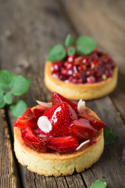 istock Cakes with fresh berries and mint leaves 1156401482