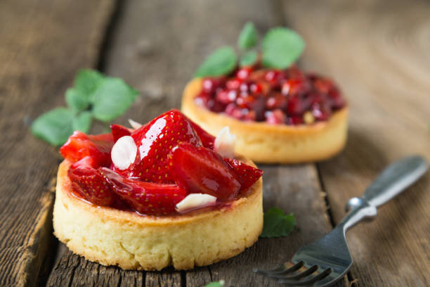 istock Cakes with fresh berries and mint leaves 1156401538