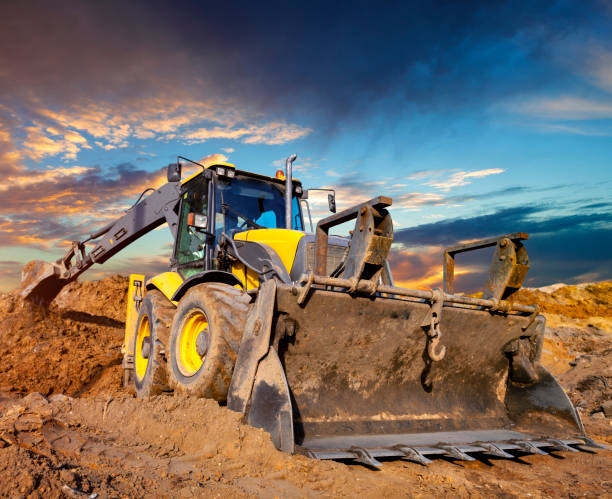 istock Earth mover in a new highway construction 1156402819