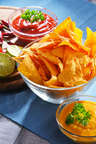 istock Composition with bowl of tortilla chips. 1156404795