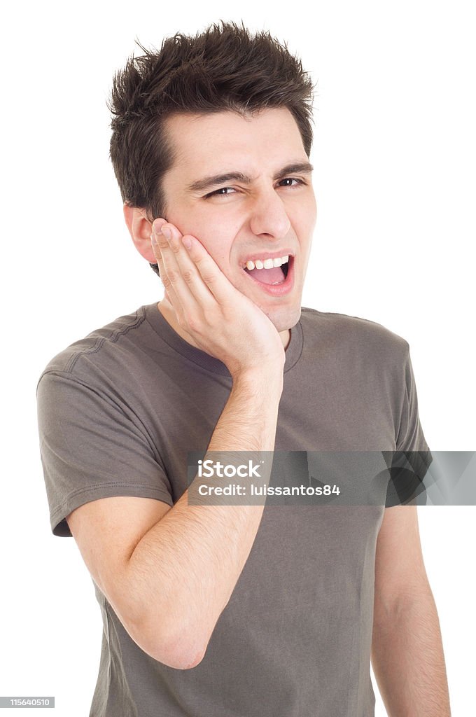 Man with toothache young casual man having a toothache isolated on white background 20-29 Years Stock Photo