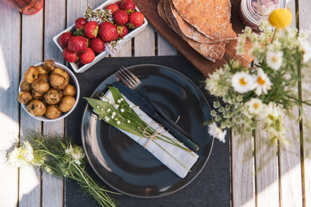 Midsummer food Swedish midsummer food and a plate. summer solstice stock pictures, royalty-free photos & images