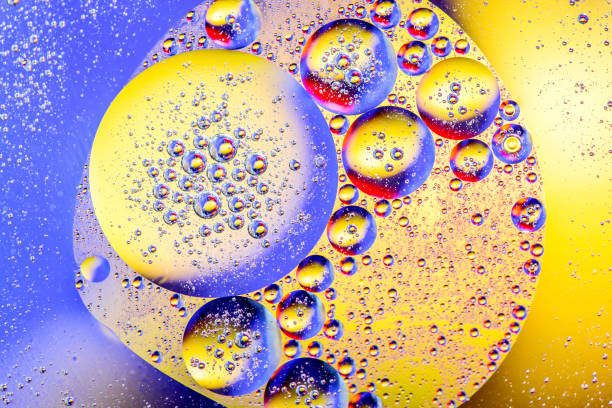 istock Scientific image of cell membrane. Macro up of liquid substances. Abstract molecule atom sctructure. Water bubbles. Macro shot of air or molecule. Biology, physics or chemistry abstract background. 1156409399