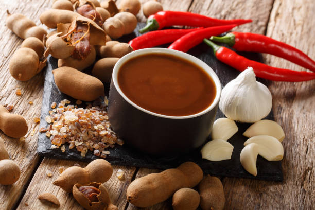 istock Thai tamarind sauce in bowl with ingredients close-up. horizontal 1156414859