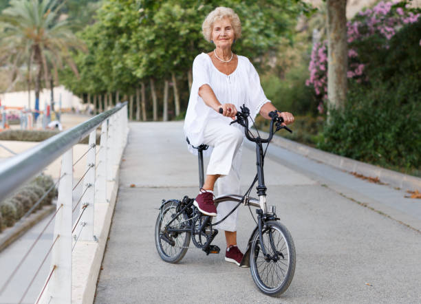 istock Elderly woman going to biking 1156417980