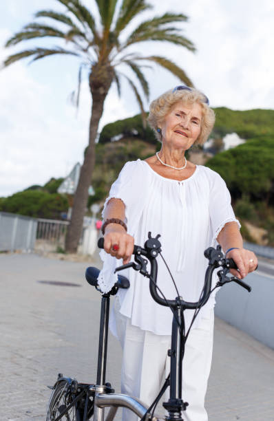 istock Elderly woman going to biking 1156417989