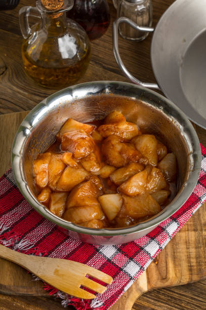 istock Chunks of chicken in marinade. 1156418000