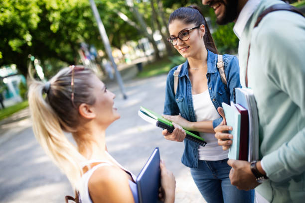 istock Group of young students are studying together in university 1156424587