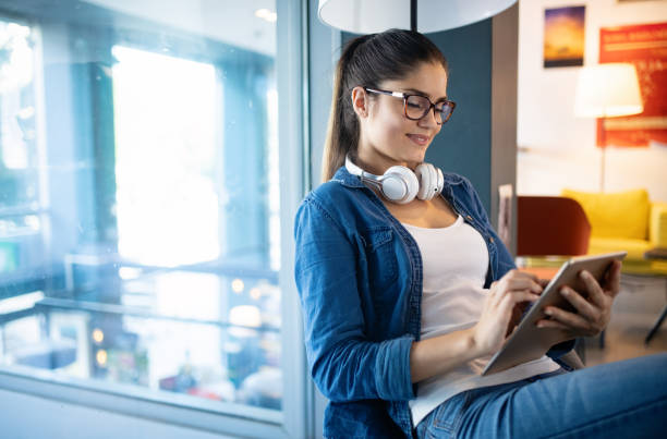 istock Beautiful student woman studying and learning at college 1156425475