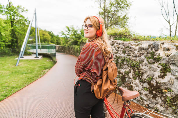istock Medicine student taking a break from studying, walking around campus, listening to music 1156426222