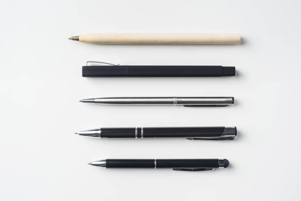 top view of collection of pens on white background - writing instrument imagens e fotografias de stock