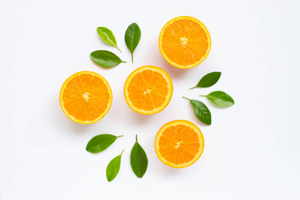 istock Fresh orange citrus fruit with leaves isolated on white background. 1156434965