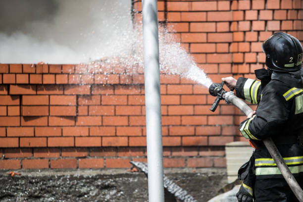 istock Firefighters on the stairs extinguish a big fire 1156435173