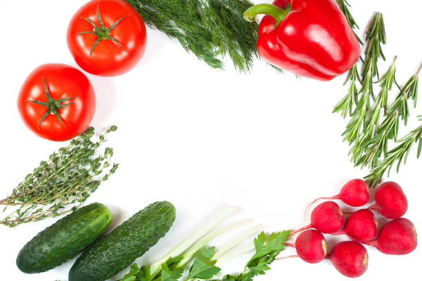 istock Fresh colorful organic vegetables captured from above (top view, flat lay). White background. Layout with free (copy) space. Healthy food conception. Ingredients for salad 1156438442