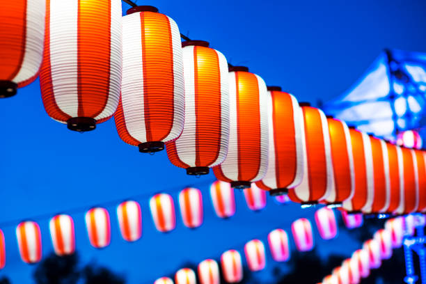 istock Orange paper lanterns strung in a line 1156439100
