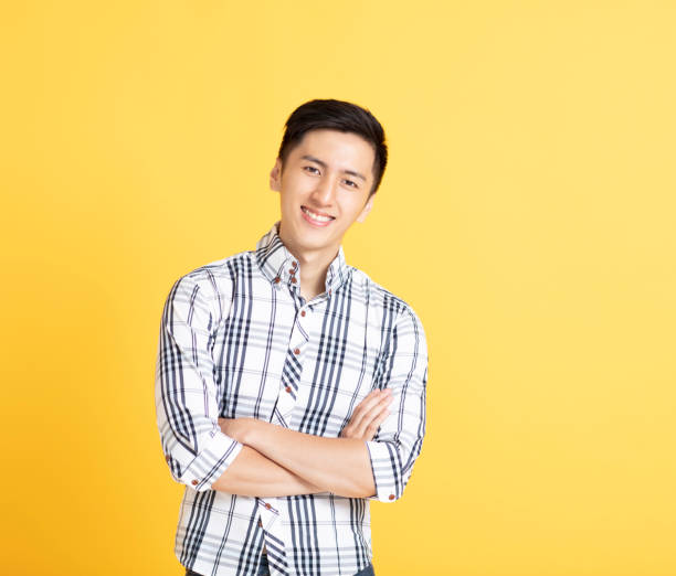 istock close up handsome young man smiling 1156440019