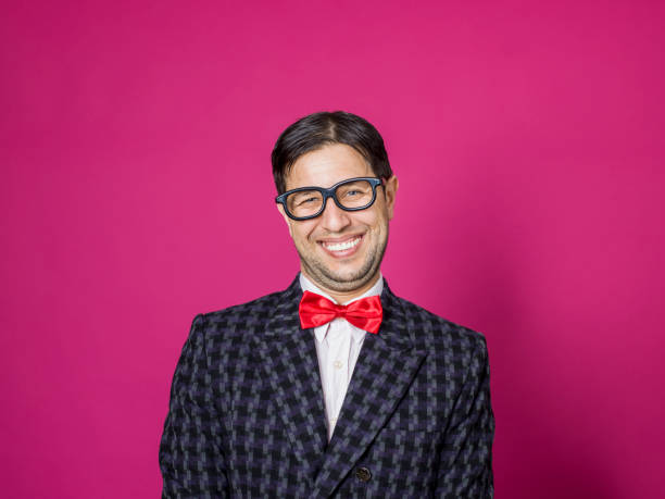 Nerd male portrait on pink