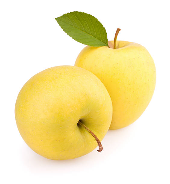 istock Two yellow apples isolated on white background 115644393