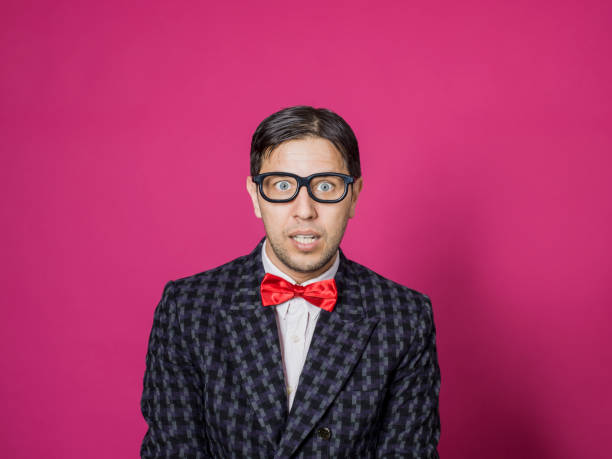 istock Nerd male portrait on pink 1156444792