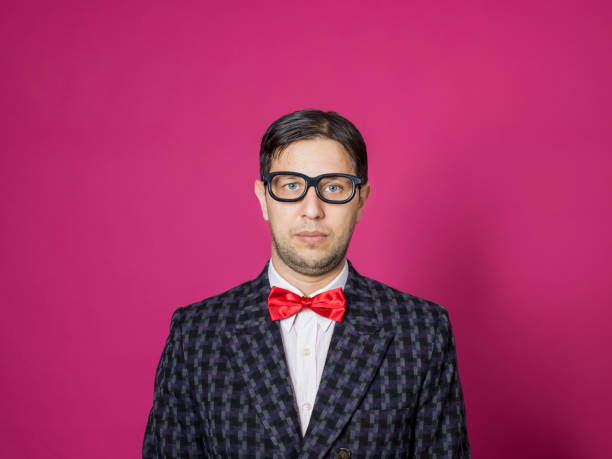 istock Nerd male portrait on pink 1156444793