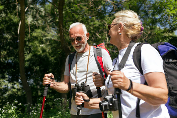 istock Senior couple hiking together 1156445309