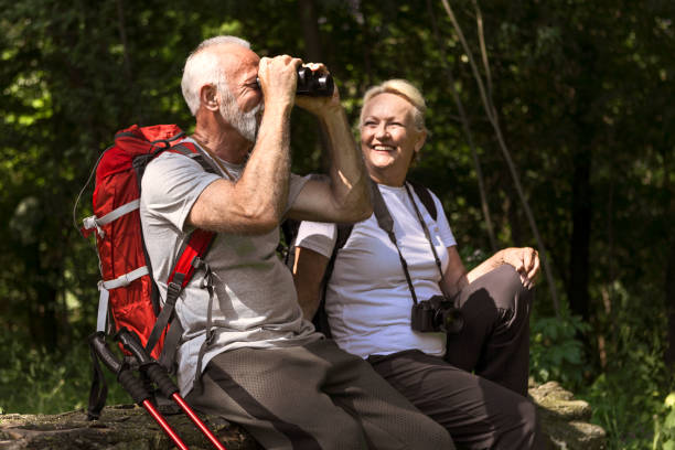 istock Senior couple hiking together 1156445323