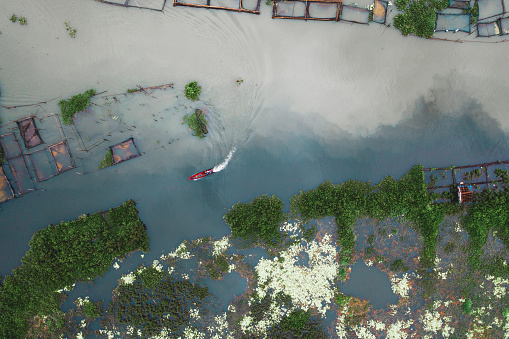 Scenic aerial  view of fishermen boat on canal