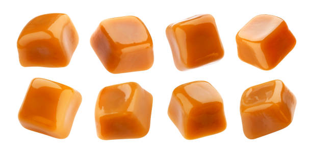 istock Caramel candies isolated on white background, collection 1156447834