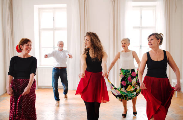 istock Group of senior people in dancing class with dance teacher. 1156447870