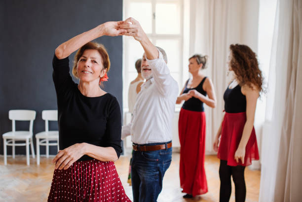 istock Group of senior people in dancing class with dance teacher. 1156447921